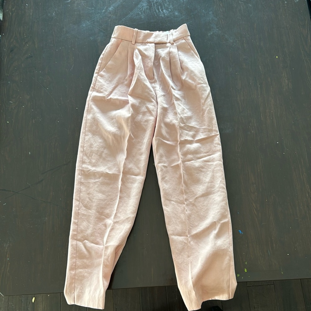 Blush pleated trousers